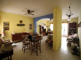 BUGIBBA - Centrally located older type spacious apartment with roof - For Sale