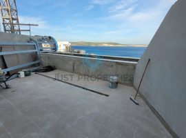 BUGIBBA - A seafront well sized one bedroom Penthouse enjoying open sea views - For Sale